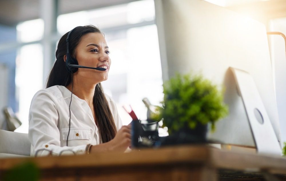 Female virtual assistant working in a sunny room