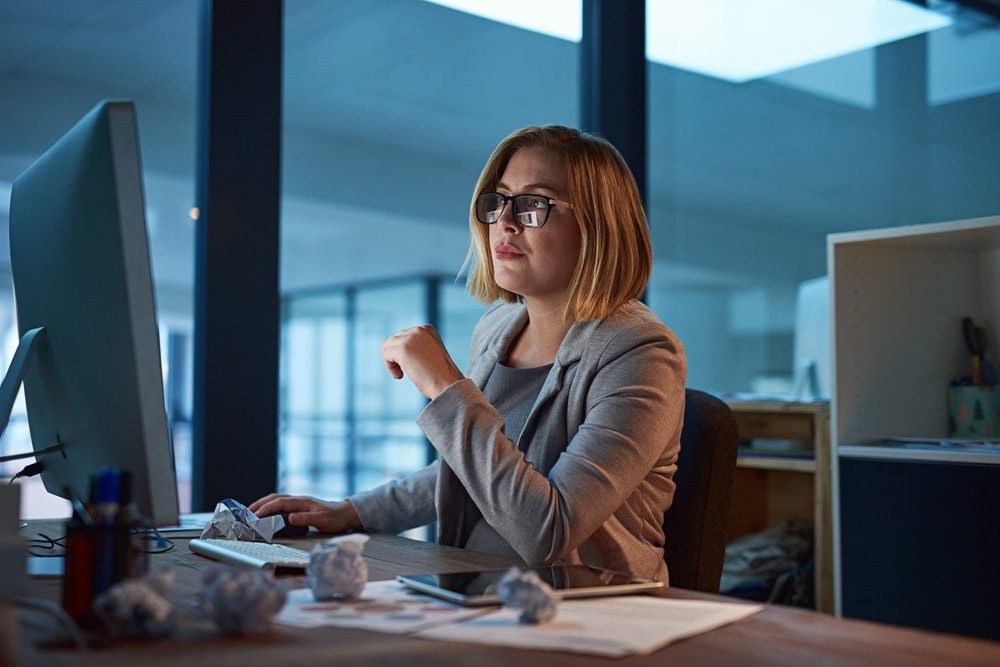 Woman with glasses virtually assisting a dental practice