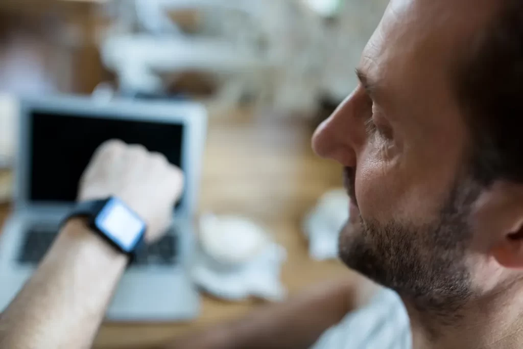 Virtual Professional checking his watch, tracking time with focus