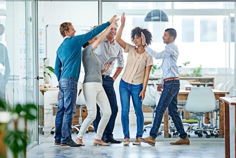 A team of virtual assistants doing a group high-five