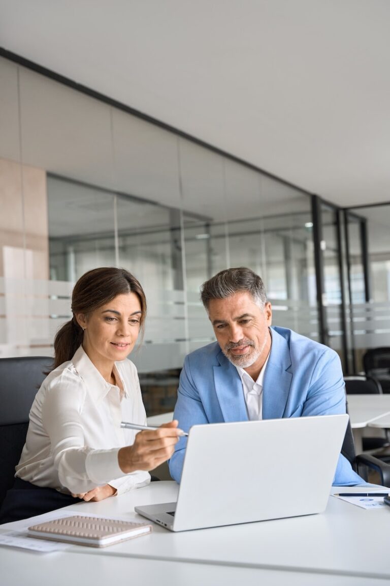 Virtual assistants working on laptop