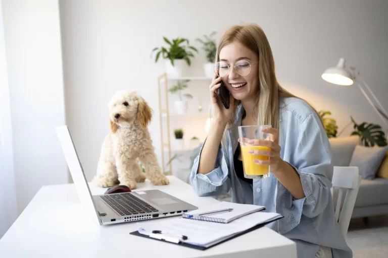 Woman working from home in Shopify