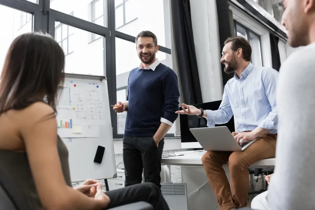 CEO collaborating with team supported by a Virtual Executive Assistant